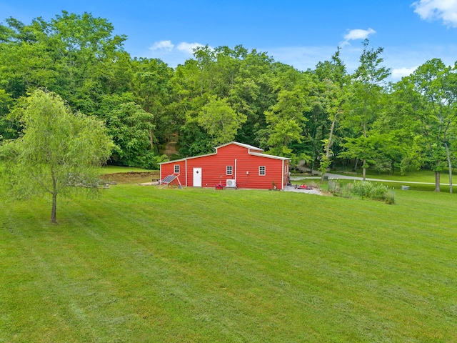 6779 Arno Allisona Rd, College Grove, TN 37046 - view of green lawn with a forest view and cooling unit