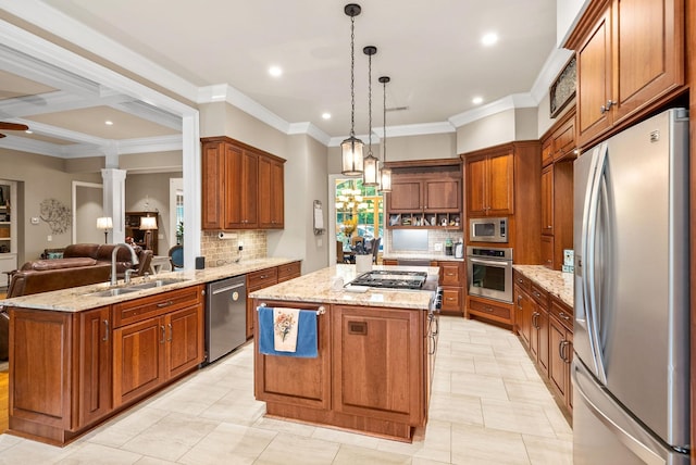 6779 Arno Allisona Rd, College Grove, TN 37046 - kitchen with appliances with stainless steel finishes, a center island, decorative backsplash, open floor plan, and brown cabinetry