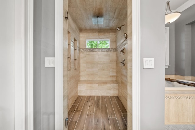 6779 Arno Allisona Rd, College Grove, TN 37046 - full bathroom featuring a tile shower, wood finish floors, and a sauna / steam room
