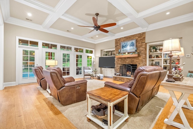 6779 Arno Allisona Rd, College Grove, TN 37046 - living room featuring coffered ceiling, light wood finished floors, a ceiling fan, beamed ceiling, and a fireplace