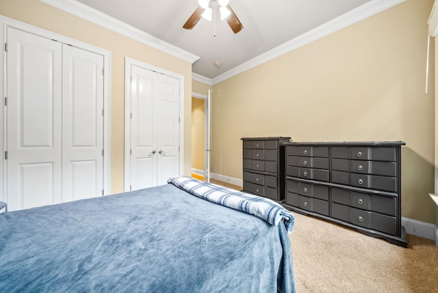 6779 Arno Allisona Rd, College Grove, TN 37046 - carpeted bedroom with crown molding, two closets, and a ceiling fan