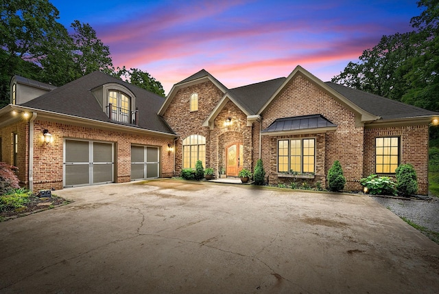6779 Arno Allisona Rd, College Grove, TN 37046 - view of front facade with brick siding, concrete driveway, and roof with shingles