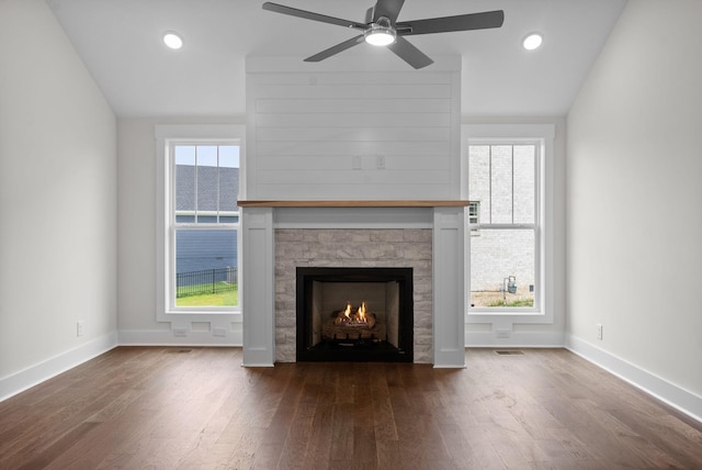 1573 Collins View Way, Clarksville, TN 37043 - unfurnished living room featuring dark wood finished floors, baseboards, a ceiling fan, a stone fireplace, and recessed lighting