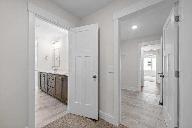 1573 Collins View Way, Clarksville, TN 37043 - hall featuring a sink, baseboards, and recessed lighting