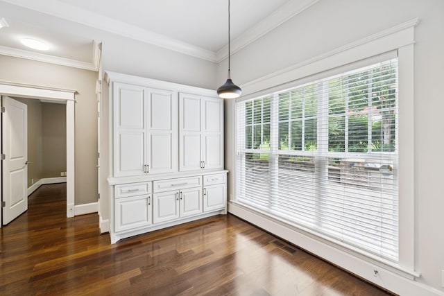286 Keswick Grove Ln, Franklin, TN 37067 - unfurnished dining area featuring crown molding, dark wood finished floors, and baseboards
