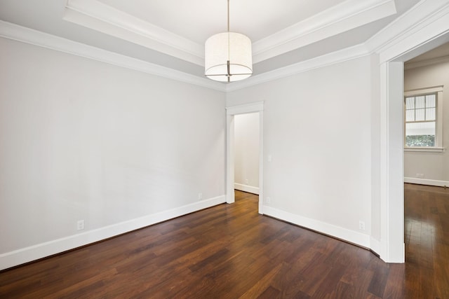 286 Keswick Grove Ln, Franklin, TN 37067 - empty room featuring wood finished floors, a tray ceiling, ornamental molding, and baseboards