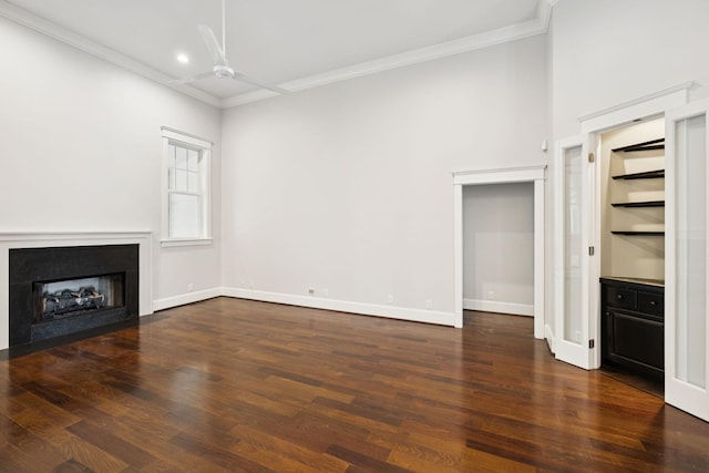 286 Keswick Grove Ln, Franklin, TN 37067 - unfurnished living room featuring ceiling fan, crown molding, wood finished floors, a fireplace, and baseboards