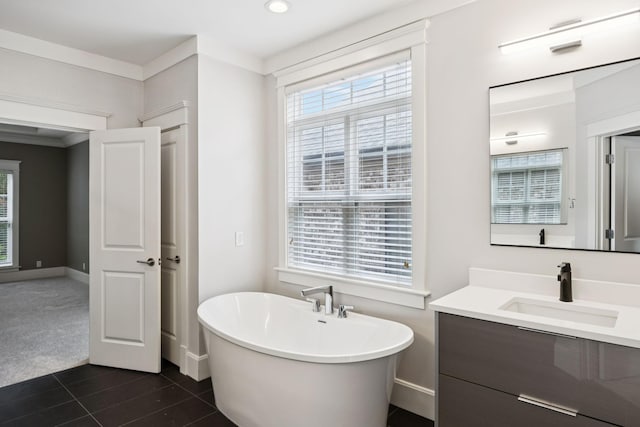 286 Keswick Grove Ln, Franklin, TN 37067 - full bathroom featuring a freestanding tub, vanity, baseboards, healthy amount of natural light, and recessed lighting