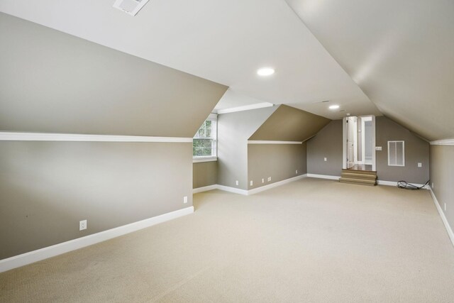 286 Keswick Grove Ln, Franklin, TN 37067 - bonus room with vaulted ceiling, light carpet, baseboards, and recessed lighting