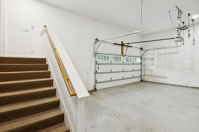 286 Keswick Grove Ln, Franklin, TN 37067 - garage with a garage door opener and baseboards