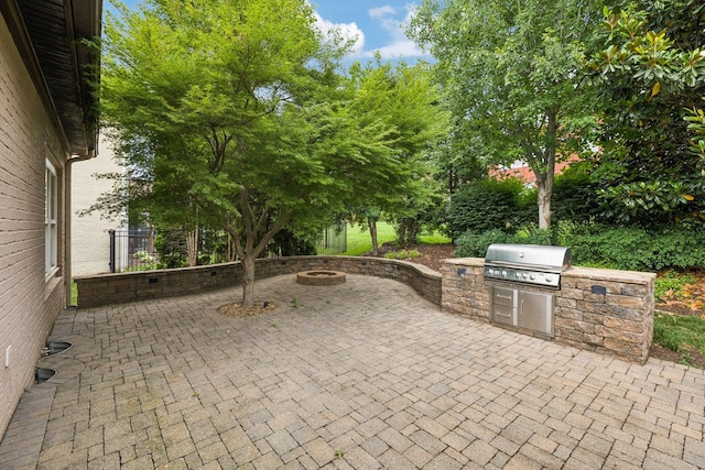 286 Keswick Grove Ln, Franklin, TN 37067 - view of patio with an outdoor fire pit