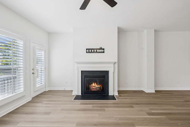 1906 Montgomery Way, Franklin, TN 37067 - detailed view of ceiling fan, wood finished floors, and a fireplace with flush hearth