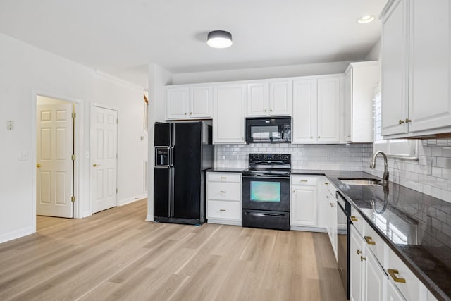 1906 Montgomery Way, Franklin, TN 37067 - kitchen with black appliances, light wood finished floors, decorative backsplash, white cabinets, and recessed lighting