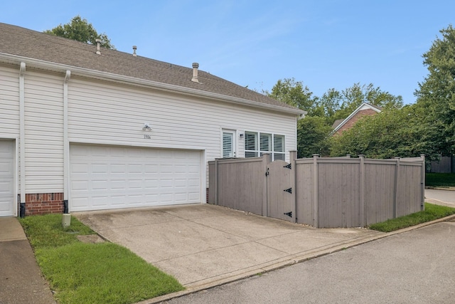 1906 Montgomery Way, Franklin, TN 37067 - garage with a gate and concrete driveway