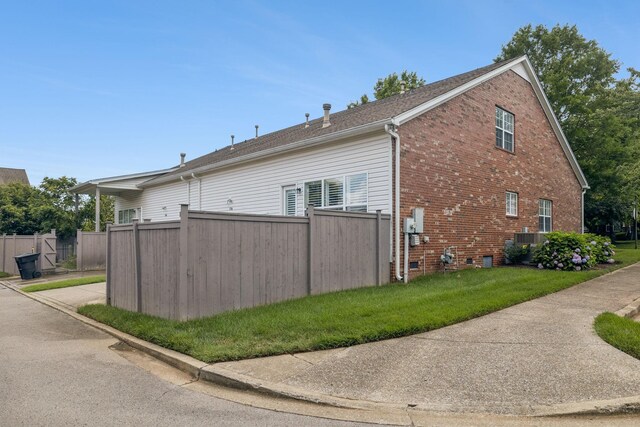 1906 Montgomery Way, Franklin, TN 37067 - view of property exterior with brick siding and a central air condition unit