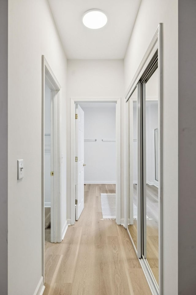 1906 Montgomery Way, Franklin, TN 37067 - hallway with light wood-style floors and baseboards