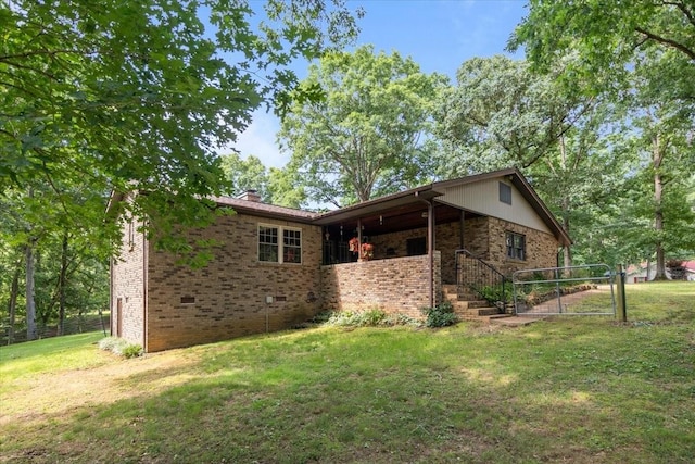 4552 Elkins Dr, Centerville, TN 37033 - view of side of home featuring brick siding, a chimney, and crawl space