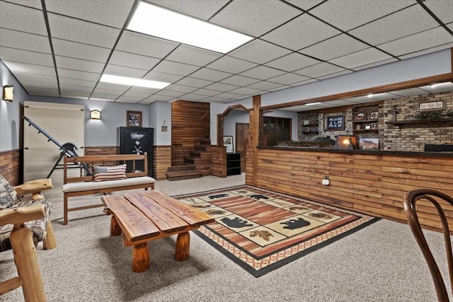 4552 Elkins Dr, Centerville, TN 37033 - living area featuring carpet, wooden walls, a wainscoted wall, and a paneled ceiling