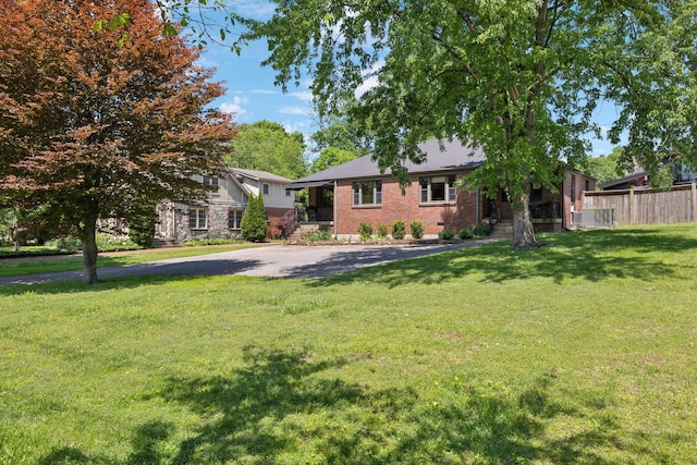 4202 Murphy Rd, Nashville, TN 37209 - view of front of property featuring brick siding and driveway