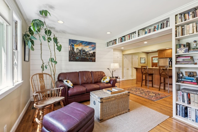 4202 Murphy Rd, Nashville, TN 37209 - living area featuring wood finished floors, wooden walls, baseboards, and recessed lighting