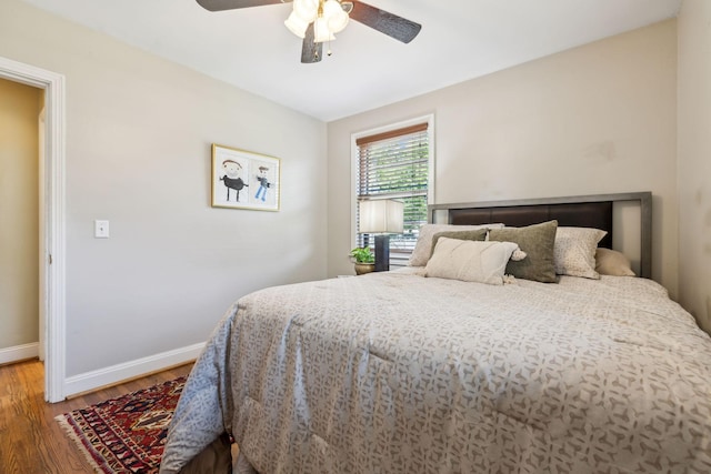 4202 Murphy Rd, Nashville, TN 37209 - bedroom with wood finished floors, baseboards, and ceiling fan