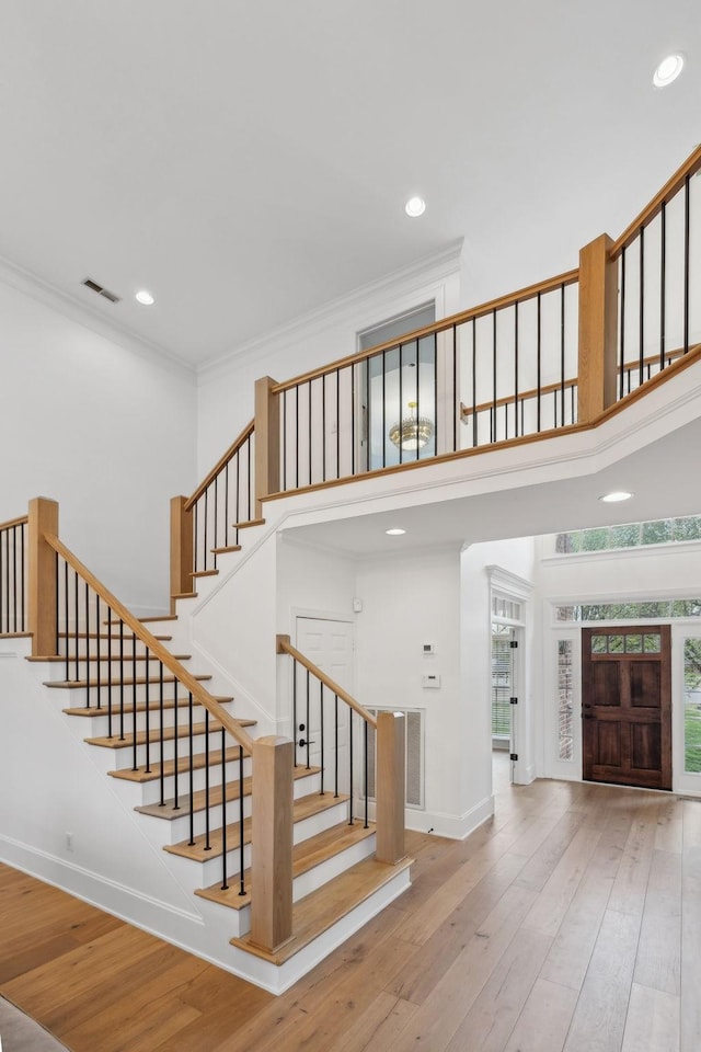 205 Well Spring Ct, Brentwood, TN 37027 - stairway with wood-type flooring, ornamental molding, recessed lighting, a towering ceiling, and baseboards