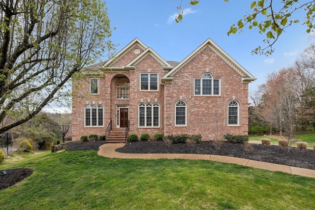 205 Well Spring Ct, Brentwood, TN 37027 - colonial-style house with brick siding and a front lawn