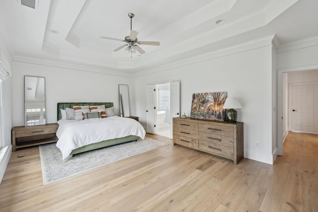 205 Well Spring Ct, Brentwood, TN 37027 - bedroom with a raised ceiling, ornamental molding, light wood-style flooring, multiple windows, and ensuite bath