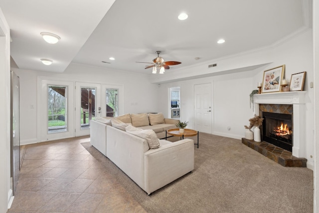 205 Well Spring Ct, Brentwood, TN 37027 - living area featuring a stone fireplace, a ceiling fan, recessed lighting, ornamental molding, and baseboards