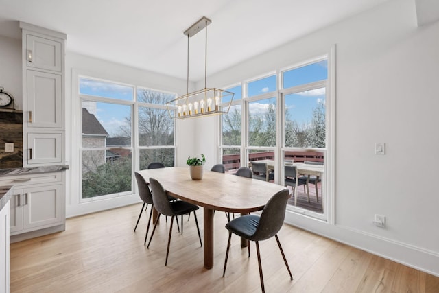 205 Well Spring Ct, Brentwood, TN 37027 - dining space with a chandelier, light wood-type flooring, and baseboards