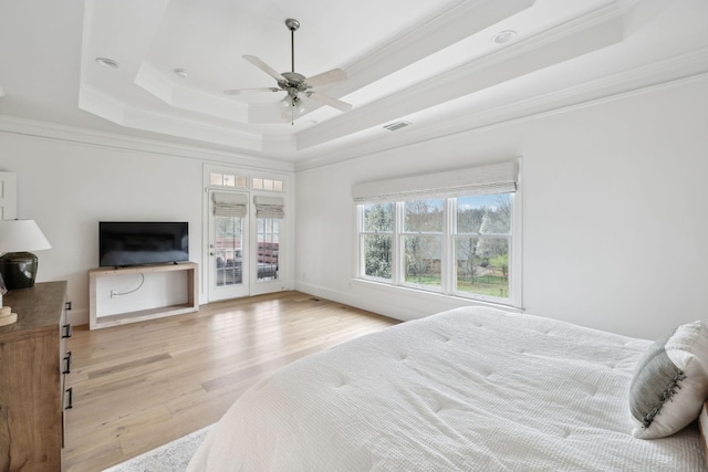 205 Well Spring Ct, Brentwood, TN 37027 - bedroom with a tray ceiling, wood finished floors, access to exterior, crown molding, and ceiling fan