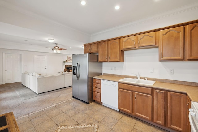 205 Well Spring Ct, Brentwood, TN 37027 - kitchen with white dishwasher, a sink, stainless steel fridge, recessed lighting, and crown molding