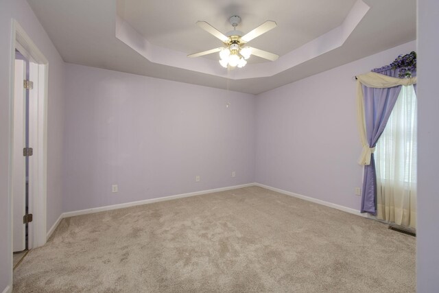 2321 Riverway Dr, Old Hickory, TN 37138 - spare room with carpet flooring, a raised ceiling, ceiling fan, and baseboards