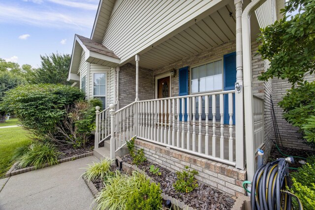 2321 Riverway Dr, Old Hickory, TN 37138 - view of exterior entry featuring covered porch and brick siding