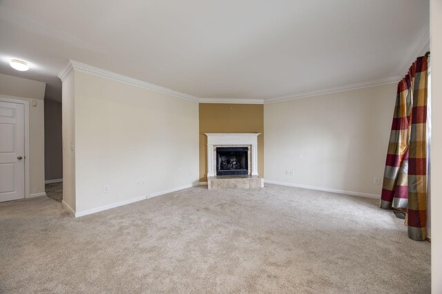 2321 Riverway Dr, Old Hickory, TN 37138 - unfurnished living room featuring ornamental molding, carpet flooring, a tiled fireplace, and baseboards