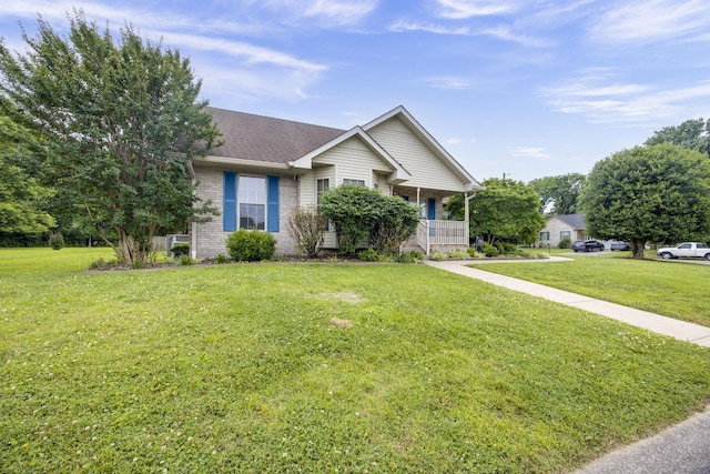 2321 Riverway Dr, Old Hickory, TN 37138 - ranch-style home featuring a front yard, a porch, brick siding, and roof with shingles