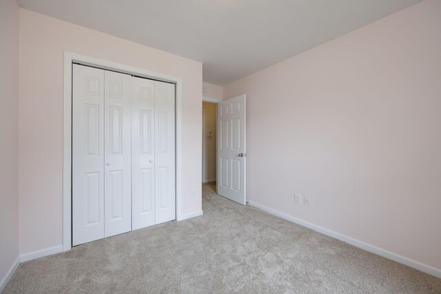 2321 Riverway Dr, Old Hickory, TN 37138 - unfurnished bedroom with carpet flooring, baseboards, and a closet