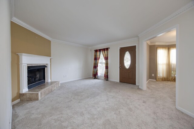 2321 Riverway Dr, Old Hickory, TN 37138 - unfurnished living room with crown molding, a tiled fireplace, carpet flooring, and baseboards