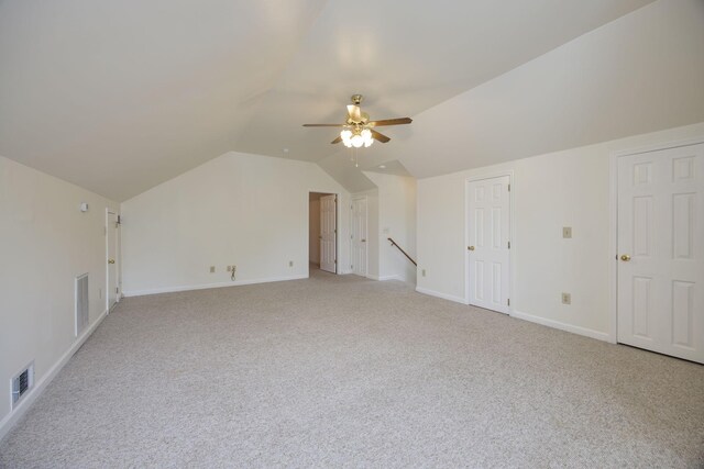 2321 Riverway Dr, Old Hickory, TN 37138 - additional living space featuring light colored carpet, vaulted ceiling, a ceiling fan, and baseboards
