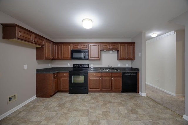 2321 Riverway Dr, Old Hickory, TN 37138 - kitchen featuring black appliances, a sink, dark countertops, and baseboards