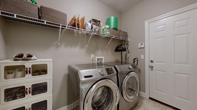 1740 Hartford Ln, Mount Juliet, TN 37122 - laundry area with separate washer and dryer, baseboards, and light tile patterned floors