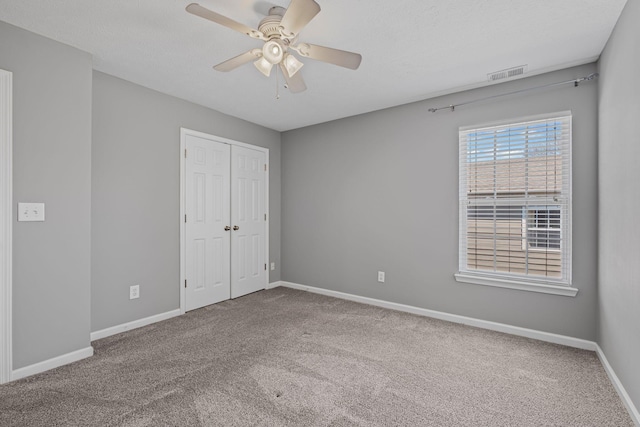 602 Pemberton Ct, Mount Juliet, TN 37122 - unfurnished bedroom featuring carpet, baseboards, a closet, and a ceiling fan