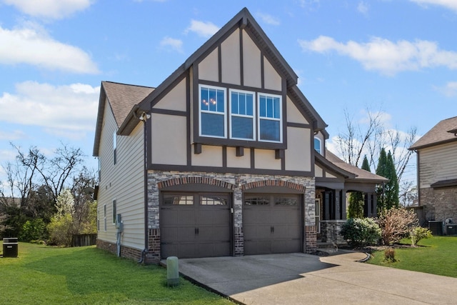 602 Pemberton Ct, Mount Juliet, TN 37122 - tudor home featuring concrete driveway, a front yard, a garage, stone siding, and central AC unit