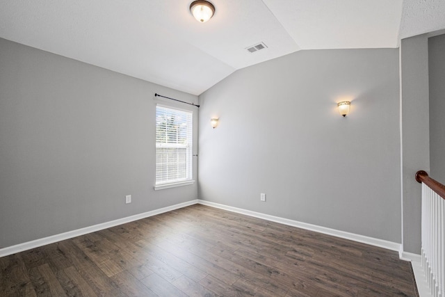 602 Pemberton Ct, Mount Juliet, TN 37122 - empty room with vaulted ceiling, dark wood finished floors, and baseboards