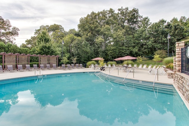 602 Pemberton Ct, Mount Juliet, TN 37122 - community pool featuring a pergola, a patio area, and view of scattered trees