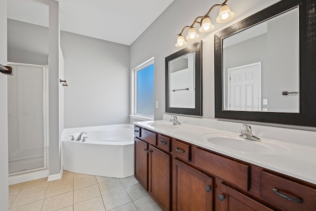 602 Pemberton Ct, Mount Juliet, TN 37122 - bathroom featuring double vanity, a garden tub, a stall shower, and tile patterned floors