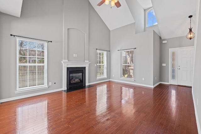 602 Pemberton Ct, Mount Juliet, TN 37122 - unfurnished living room with high vaulted ceiling, plenty of natural light, ceiling fan, and baseboards