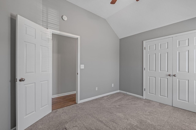 602 Pemberton Ct, Mount Juliet, TN 37122 - unfurnished bedroom featuring carpet flooring, vaulted ceiling, a closet, ceiling fan, and baseboards