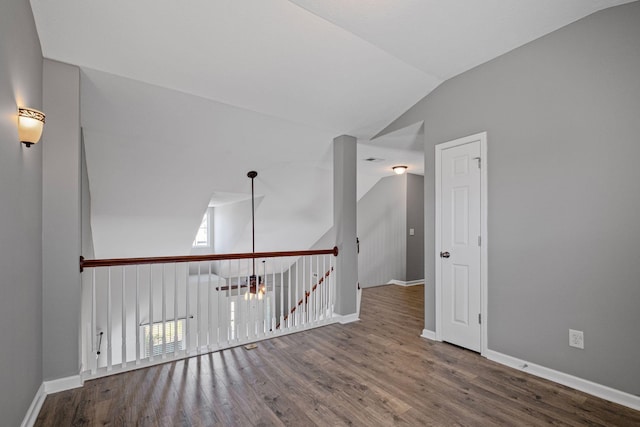 602 Pemberton Ct, Mount Juliet, TN 37122 - unfurnished room with vaulted ceiling, wood finished floors, and baseboards