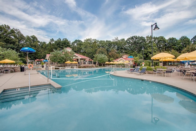 602 Pemberton Ct, Mount Juliet, TN 37122 - community pool with a patio and view of wooded area
